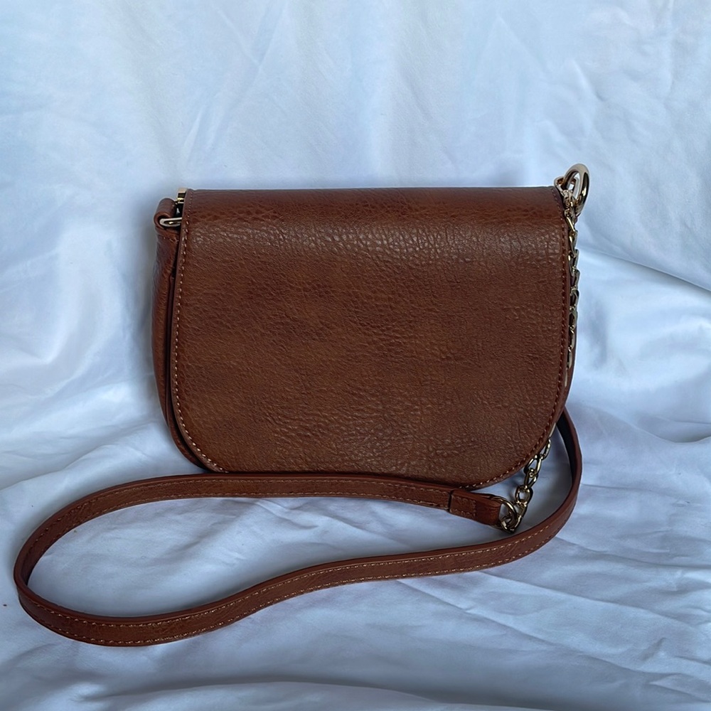 Madison West crossbody bag, faux brown leather, brown strap with gold chain.